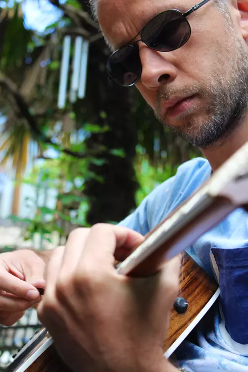 Byebyefish Close up portrait with a guitar